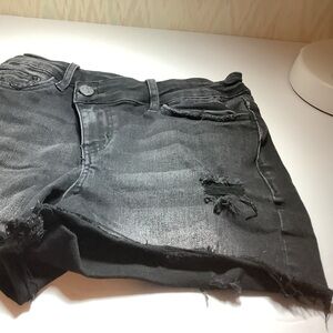 Bayeas distressed, black denim cut off shorts.